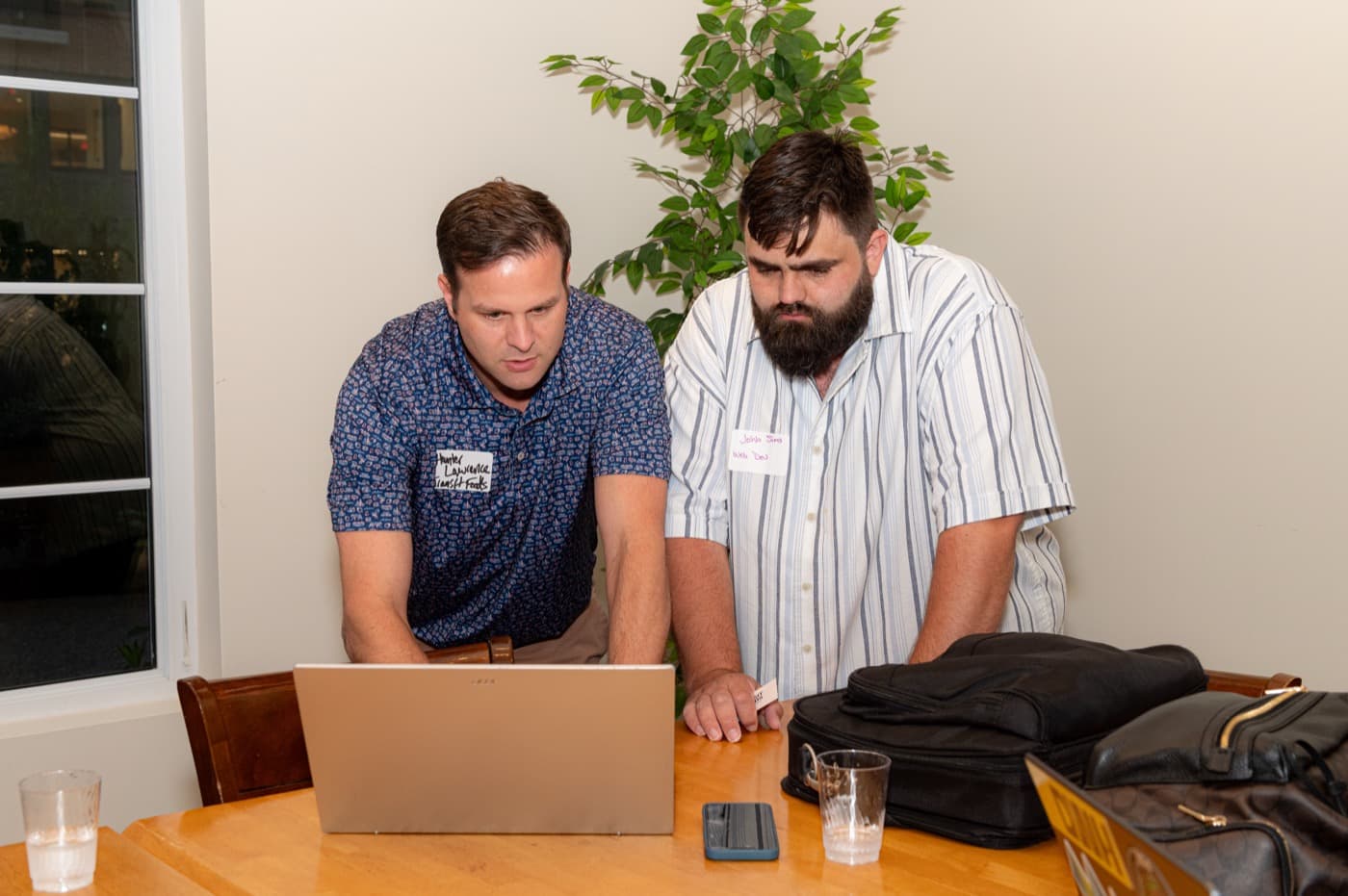 DevHouse Room #2 — two builders deep in a walkthrough