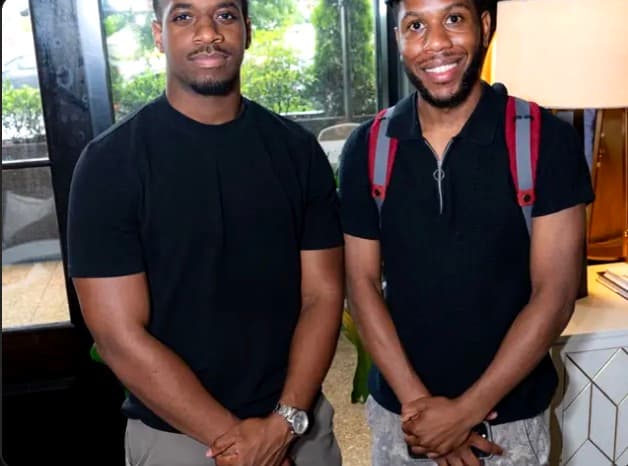 Larry Nicholas and Cabril DeAbreu (Cartana) standing together